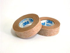3M Micropore tan surgical tape close-up demonstrates hypoallergenic paper texture for sensitive skin