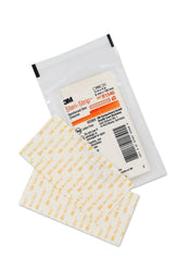 3M Steri-Strip reinforced adhesive closure on a clean incision showing strong wound support.