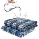 AbleUplift bed pads with blue plaid cover offer discreet night protection.