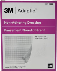 Adaptic non-adherent dressing 3x3 box of 50, protects wounds while easing removal.