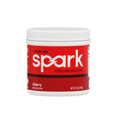 AdvoCare Spark cherry powder tub pour for on-the-go energy.