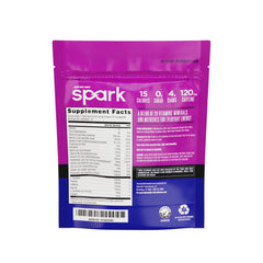 AdvoCare Spark grape stick pack in hand, ready for a focused moment