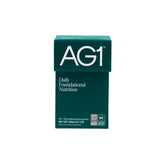 AG1 classic formula powder scoop for daily nutrition and gut support.