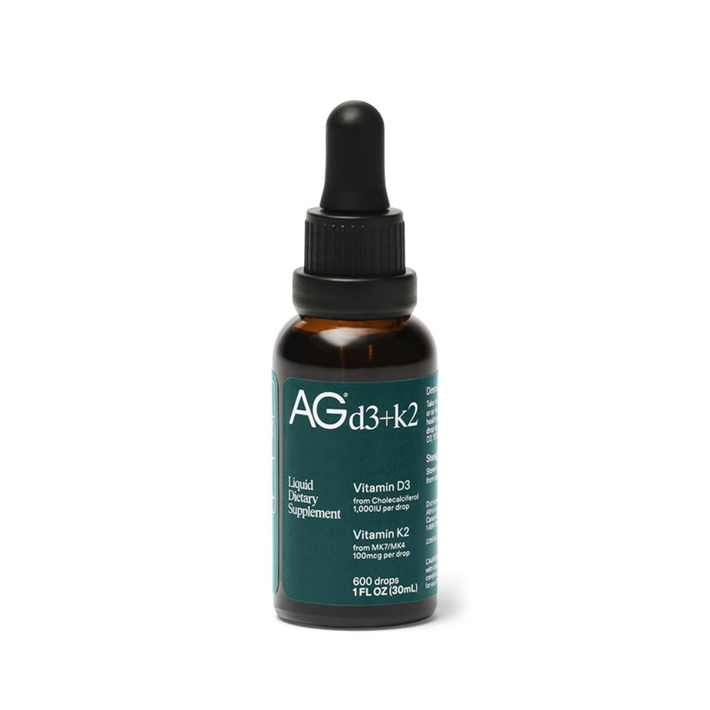 AG1 Vitamin D3+K2 Drops bottle highlights easy oil-based formula for daily absorption.