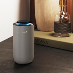 Air-Scent Mini diffuser in a compact travel setup highlighting portability.