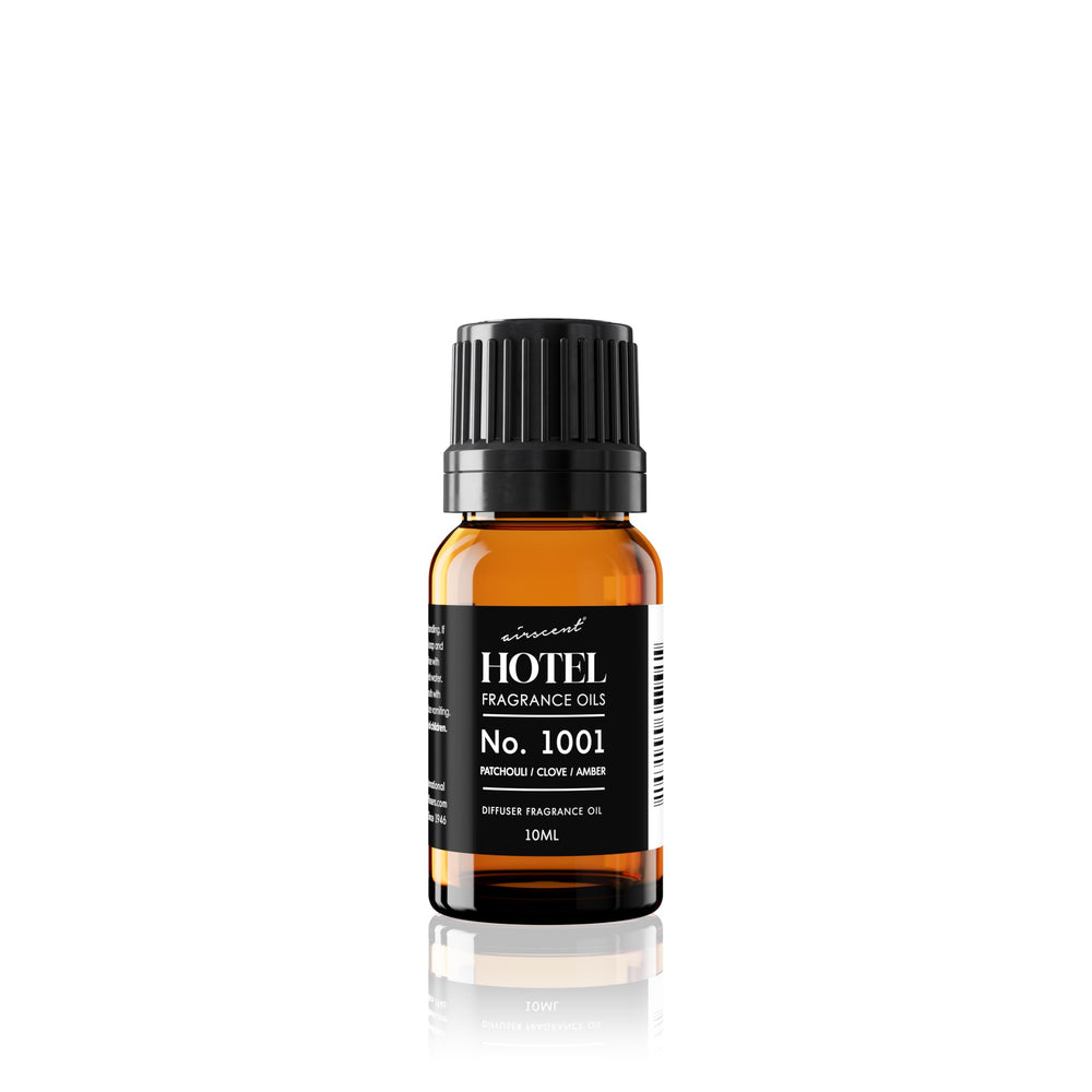 Air-Scent No.1001 bottle pour for patchouli-clove-amber aroma in premium diffusion.