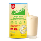Almased Vanilla Shake bottle on kitchen counter, high-protein meal replacement.