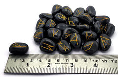 Amazing Gemstone close-up shows fine engraving on a black agate rune