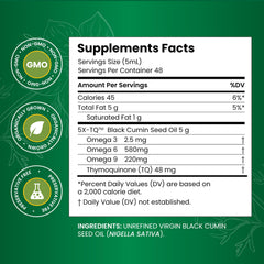Amazing Herbs Black Seed Oil pour showing smooth flow for precise dosing.