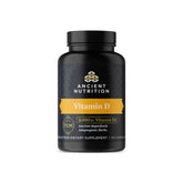 Ancient Nutrition Vitamin D 5000 IU bottle on white surface suggests daily immune and bone support.