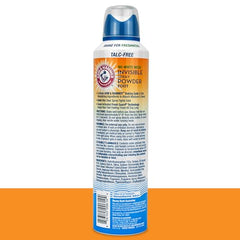Close-up shows clear spray going on feet with no white residue