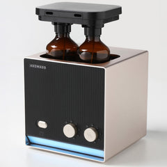 Aromadd dual-nozzle diffuser demonstrates two scent options for flexible ambiance.
