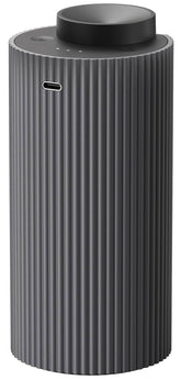 Aromadd home mode diffuser in a living room delivering steady fragrance.