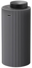 Aromadd home mode diffuser in a living room delivering steady fragrance.