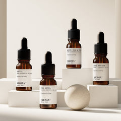 AromaTech Santal oil bottle highlights woody, warm fragrance.