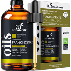 Artnaturals Frankincense essential oil bottle promotes a calming atmosphere when used in a diffuser.