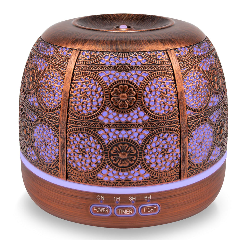 ARVIDSSON 500ml diffuser on table featuring Moroccan design for elegant ambiance.