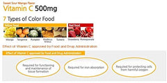 ATOMY Colorfood Vitamin C scoop beside glass emphasizes portion control for servings.