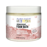 Aura Cacia Peaceful Patchouli and Sweet Orange foam bath jar, promotes calm relaxation.