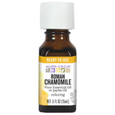 Aura Cacia Roman Chamomile in Jojoba Oil bottle pour for calming rituals.