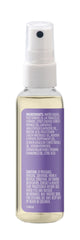 Aura Cacia Chill Pill Mist patchouli bottle promotes earthy mood enhancement during work.