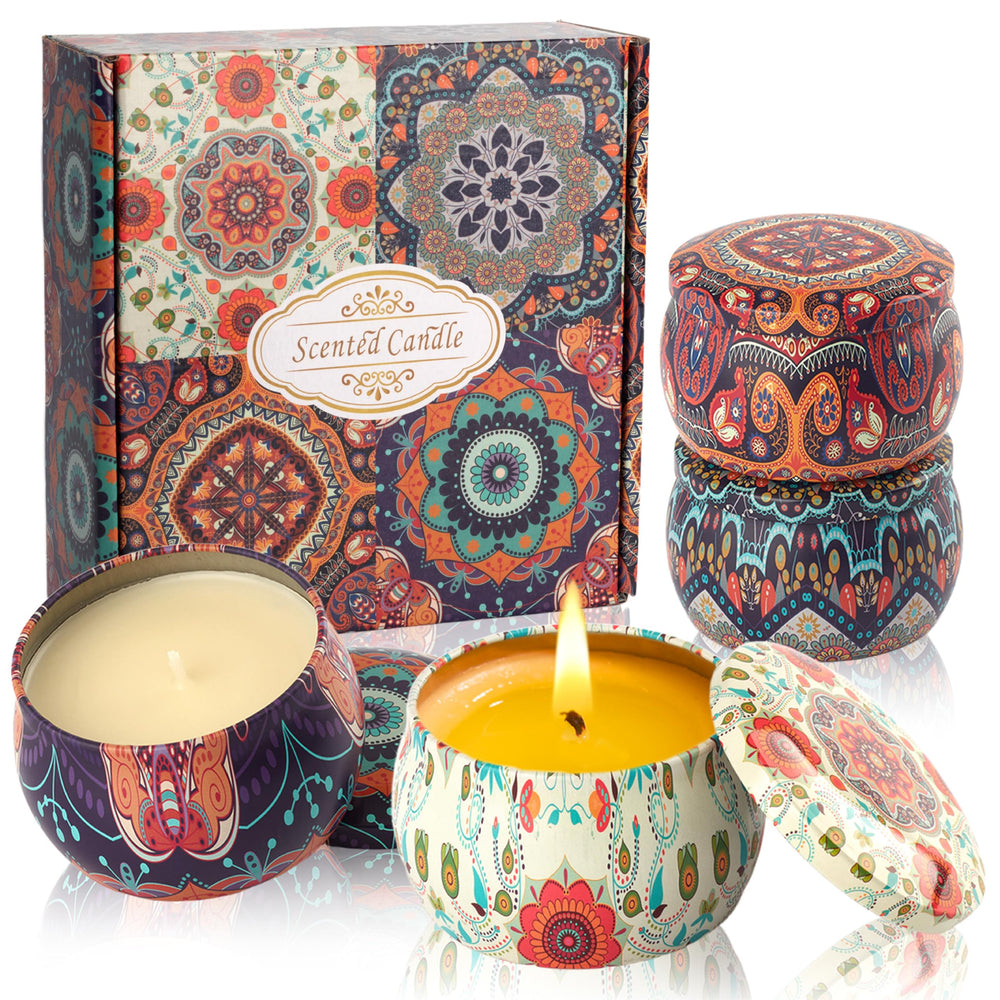 Auralome gift-set four-pack scented candles in elegant tins for cozy home ambiance.