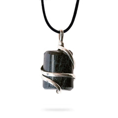 Ayana Wellness raw black tourmaline pendant closeup for protection and focus.