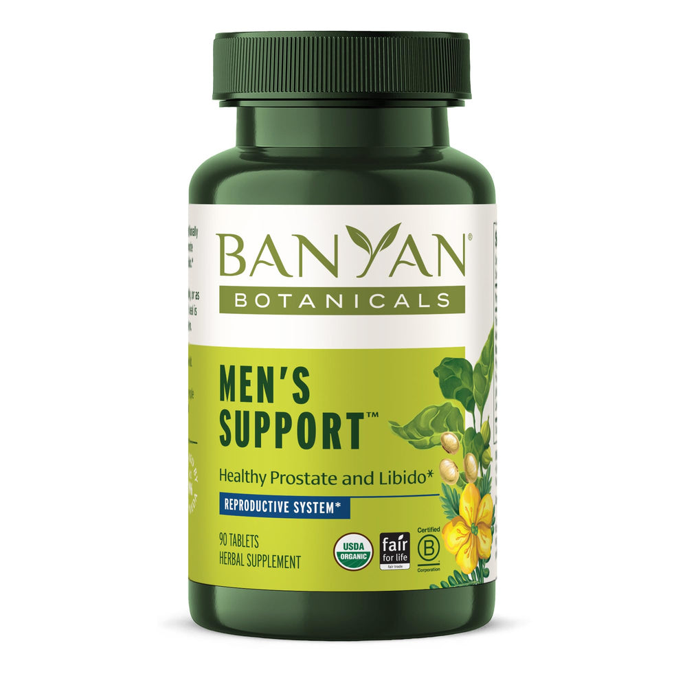 Banyan Botanicals Men’s Support Tablets bottle on a desk for daily wellness routine.