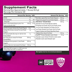 Bare Performance Nutrition Strong Reds bottle with glass of juice showing vibrant berry antioxidants.