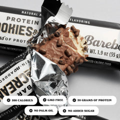 Barebells breakfast setup with cookies and cream bar beside coffee.