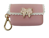 Bath and Body Works Sweetheart Song pink scalloped bow snap case keeps sanitizer accessible on the go.