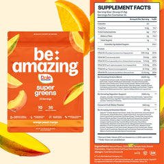 BE AMAZING Super Greens powder being poured into a glass for easy mix.