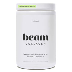 Beam Collagen Powder tub close-up showing grass-fed formula for skin support.