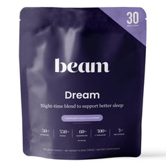 Beam Dream Sleep Powder tub close-up showing vegan, non-GMO formula for calm nights