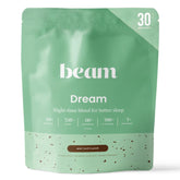 Beam Dream Sleep Powder tub showing a vegan, non-GMO formula for a calming evening