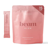 Beam Glow bottle with label highlighting hormonal balance support.