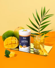 Texture close-up of Bella All Natural Detox Powder Mango for smooth mixes.