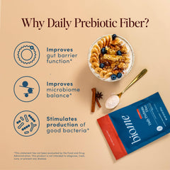 Bio.me Daily Prebiotic Fiber Powder Chai in a glass shake for on-the-go digestion support.