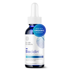 Biocidin Liquid bottle closeup showing premium botanicals for gut balance.