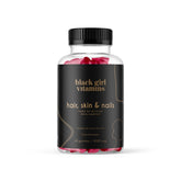 Black Girl Vitamins bottle with passion fruit gummies for hair, skin, and nails.