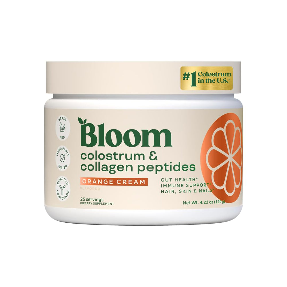 Bloom Nutrition bovine colostrum orange-cream tub showing powder texture for gut support.