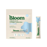 Bloom Nutrition colostrum packet open for convenient immune and gut support.