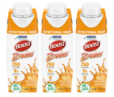 BOOST Breeze orange nutritional drink in a glass, on-the-go energy.