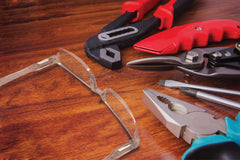 Boost Eyewear rectangular satin-finish half-rim offers a modern, unobtrusive look.