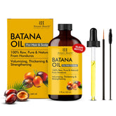 Botanic Hearth Batana Oil bottle pour shown for nourishing scalp and hair.