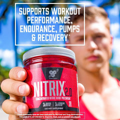 BSN NITRIX 2.0 tablets poured beside a glass for a pre-workout ritual
