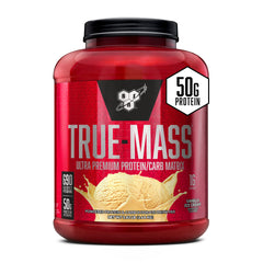 BSN TRUE-MASS bottle pour of a creamy vanilla shake for post-workout fueling