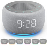 Buffbee alarm clock on a nightstand with a soft glow for gentle winding down