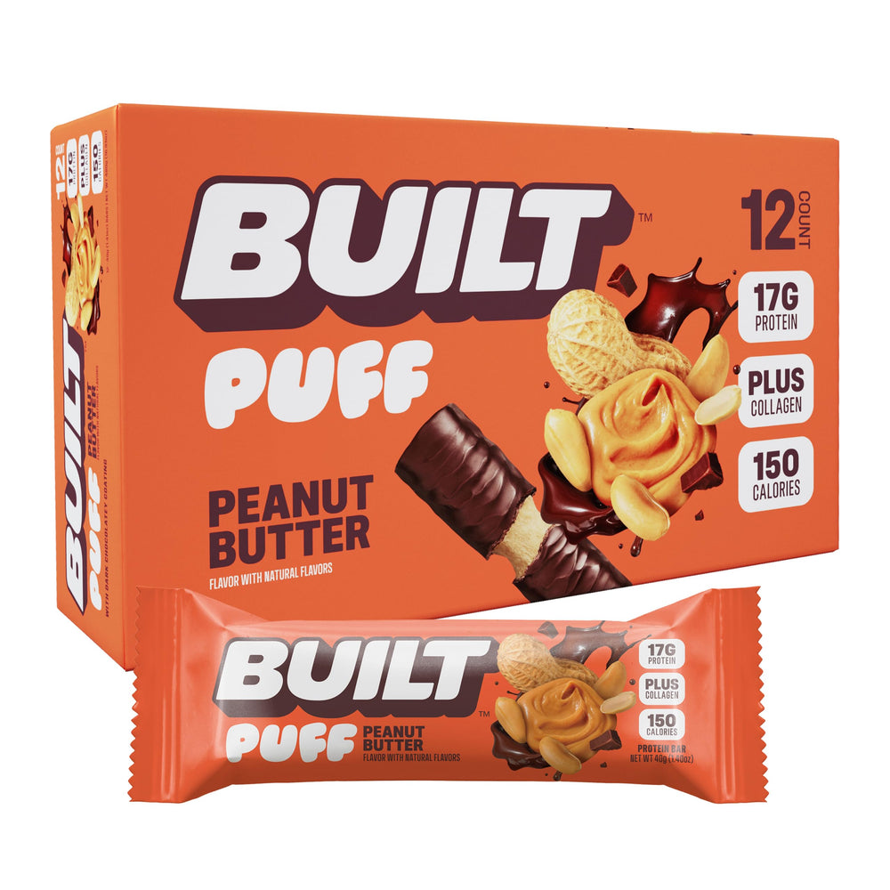 Built Bar Puffs Peanut Butter Bar in hand for on-the-go energy