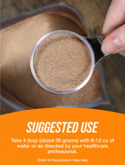 Pouring BulkSupplements Almond Protein Powder into a glass for a drink.